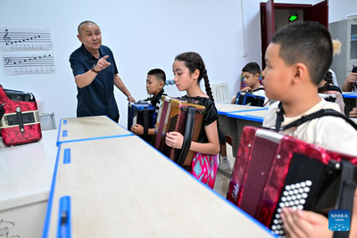 Tacheng City promotes accordion culture, tourism in NW China&#039;s Xinjiang